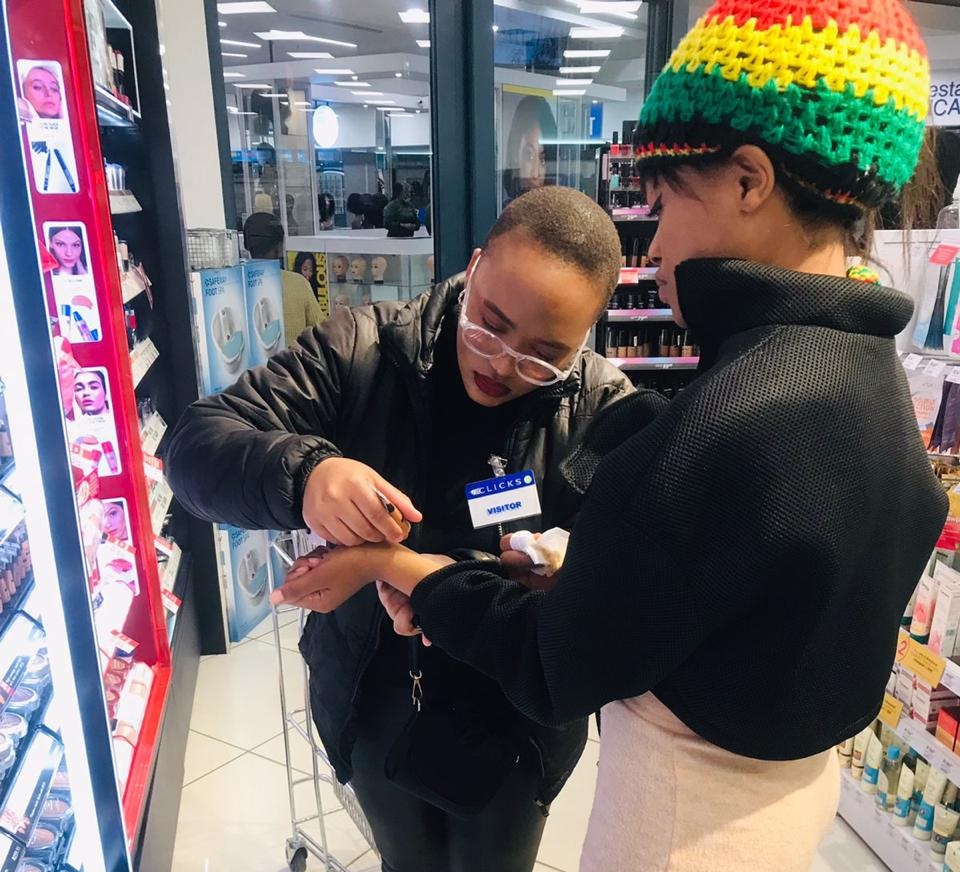 In-store promoter engaging with customers